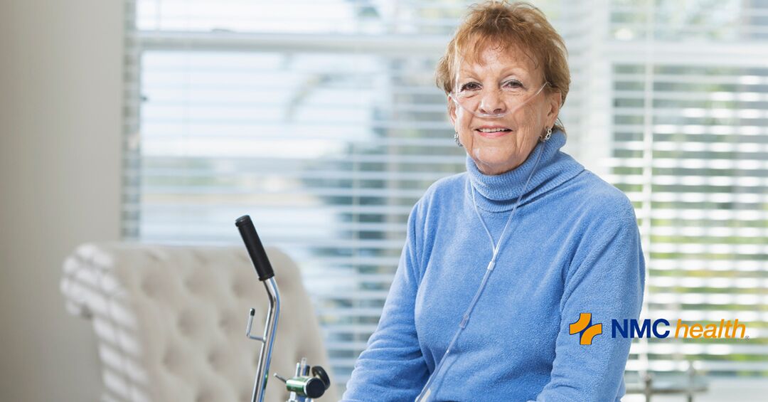 old woman wearing oxygen and smiling because she understands medicare