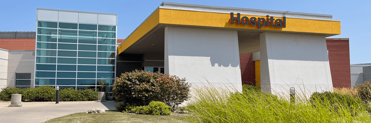 Exterior of front of NMC Health hospital private insurance and Medicaid Medicare